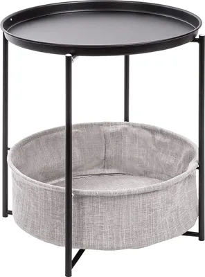A round side table with a black metal frame and a black tray top, featuring a gray fabric basket underneath for storage.