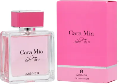 A bottle of Aigner Cara Mia Solo Tu Eau de Parfum for women and its pink packaging are displayed side-by-side against a white background.