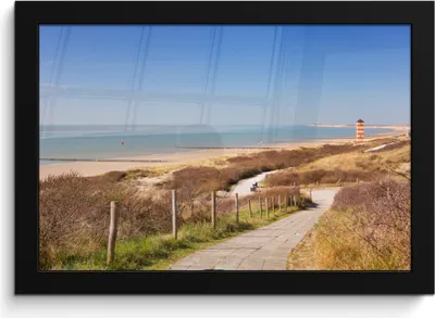 Produktbild von MuchoWow® MuchoWow® Gerahmtes Poster Strand - Meer - Leuchtturm - Niederlande 30x20 cm - Poster mit zchwarzem Bilderrahmen - Kunstdruck - Bild-Poster