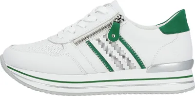 A side view of a single white sneaker with green accents.