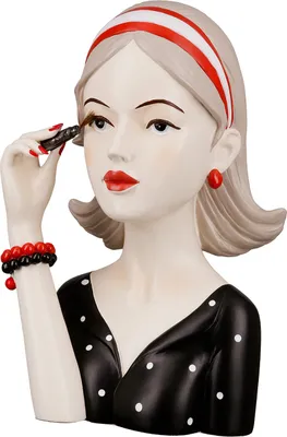 A decorative bust of a woman applying mascara.
