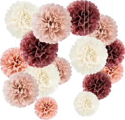 A collection of decorative paper pom-poms in various sizes and colors.