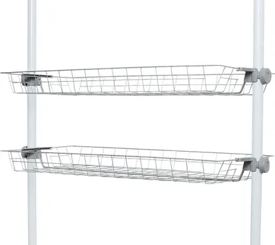 Two wire storage baskets are attached to a white pole.