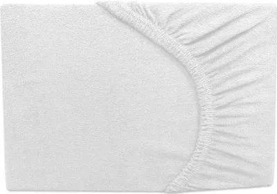 A white fitted sheet is shown from a top-down perspective, with the elasticized edge visible on the right side.