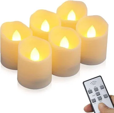 Immagine prodotto di Set di candeline LED con timer e telecomando - 6 pezzi - fiamma tremolante - alimentate a batterie - 6 ore accese, 18 ore spente - bianco caldo - impermeabili.