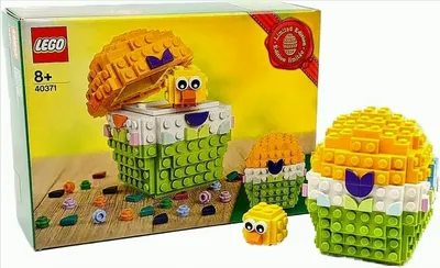 A LEGO Easter egg set with chicks and loose bricks on a wooden surface.