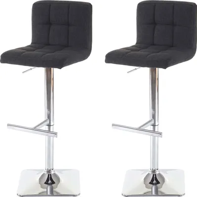 Two dark gray bar stools with chrome bases and footrests are shown against a white background.