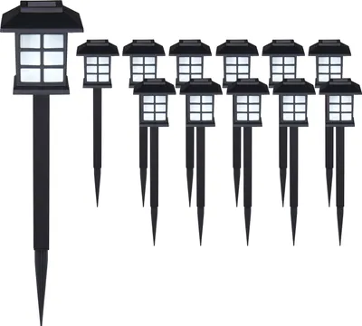 A set of solar garden lights arranged in a row against a white background.