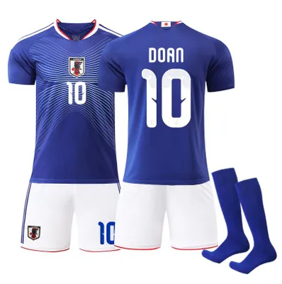 Immagine prodotto di #10 DOAN Maglia da calcio della nazionale giapponese di casa in pantaloncini bianchi per i Mondiali 2026, disponibile per bambini e adulti. TAGLIA:20