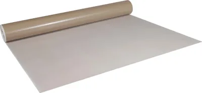 A roll of protective paper is unrolled on a white surface.