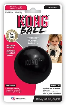 Product packaging for a KONG Extreme Ball dog toy, showing the ball and a child with a dog.