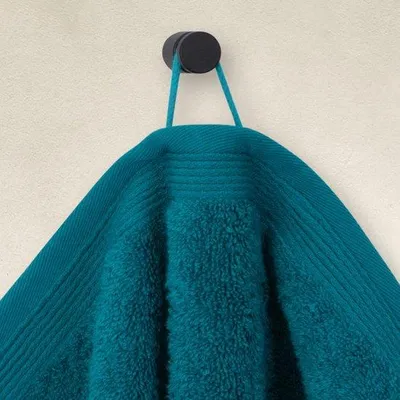 Zdjęcie produktu dla Ręcznik Unyqoos® 50 x 100 cm – miękki, chłonny ręcznik frotte wykonany w 100% z bawełny, kolor: lagunowy, minimalistyczny design, bez logo