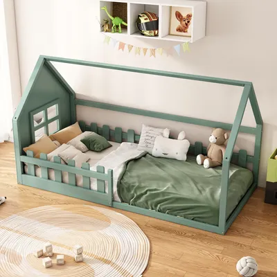 A child's bedroom with a house-shaped bed.