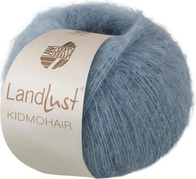 A ball of blue-grey mohair yarn with a label.