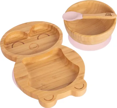 A bamboo plate and bowl set for babies and toddlers, designed with a cute animal face.