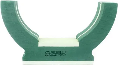 Produktbild von OASIS® Nass-Steckmasse DINETA mit Urnenstellfläche, Trauerfloristik, Polystyrol Hartschaumboden, grün, 57x12x32cm - Nasssteckschwamm