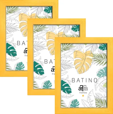 Three yellow picture frames are arranged in a staggered formation against a white background. Each frame contains a print of tropical leaves in shades of green and yellow.