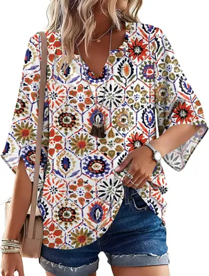 Productafbeelding van Damesblouse met bloemenprint, 3/4 mouwen, V-hals en losse snit
