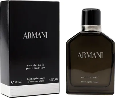 Schwarze Verpackung und passender Flakon von Armani Eau de Nuit pour Homme Aftershave Lotion, 100 ml, mit silbernem Logo.