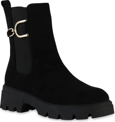 A black suede boot with a gold buckle detail and a thick lug sole.