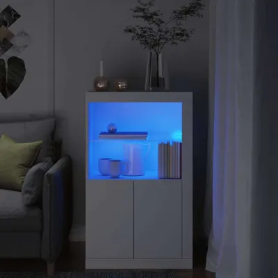 A modern living room scene with a white cabinet featuring blue LED lighting.