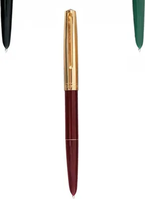 A close-up studio shot of a burgundy and gold fountain pen against a white background.