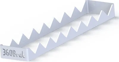 A white metal rack with a zig-zag pattern, designed to hold multiple items.