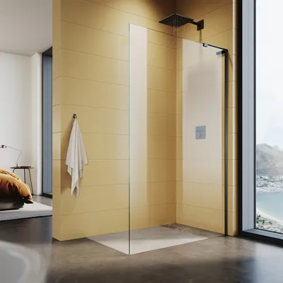 A modern bathroom with a walk-in shower, featuring a large window with a view of the sea and mountains.