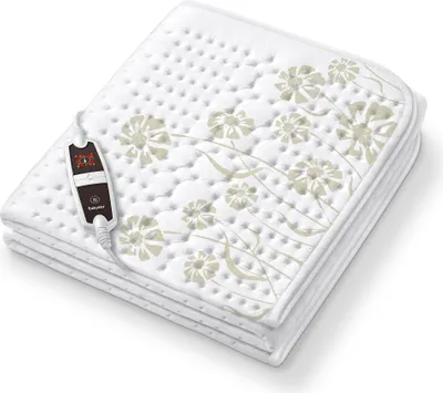 A folded electric blanket with a floral pattern and a control unit.