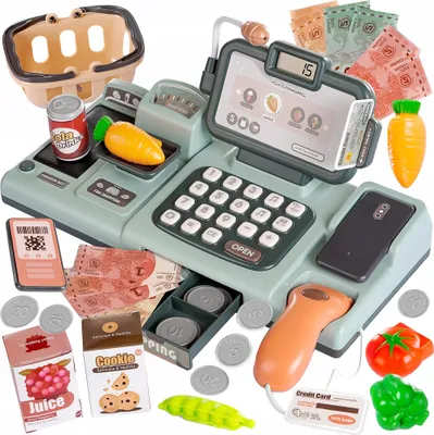 A toy cash register with various accessories, including toy food, money, and a scanner.