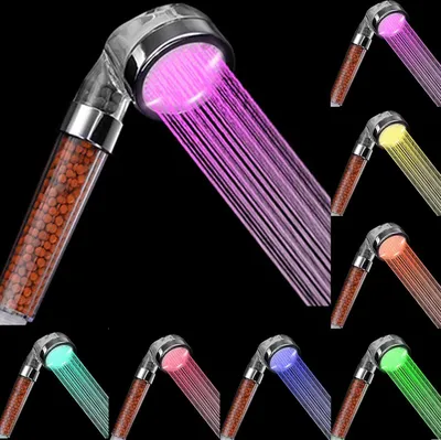 A collage of LED shower heads with different colored water streams against a black background.