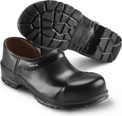A pair of black Sika clogs, one shown from the side and the other from the sole.