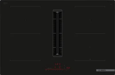 A top-down view of a black induction cooktop with an integrated downdraft ventilation system.