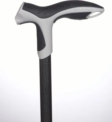 A close-up studio shot of the handle and upper shaft of a walking cane against a white background.