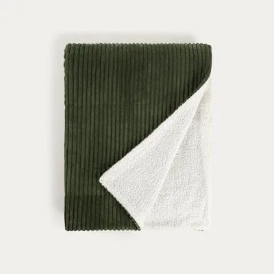 Zdjęcie produktu dla HOMLA Koc MIRADO zielony o strukturze sztruksu z podbiciem boucle 150x200 cm
