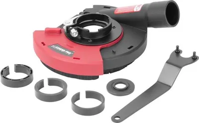 A dust collection shroud and accessories for an angle grinder are laid out on a white background.