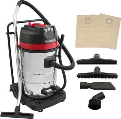 A studio shot of a wet and dry vacuum cleaner with accessories and dust bags.