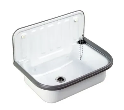 A white sink with a gray rim and a chain for the drain stopper, isolated on a white background.