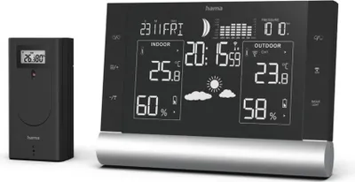 A black weather station with a separate sensor unit, displayed on a white background.