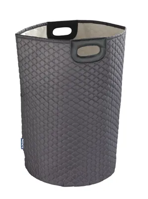 A gray quilted laundry basket with black handles against a white background.