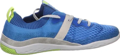 A side view of a blue athletic shoe against a white background.
