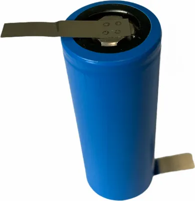 A close-up studio shot of a blue battery with metal tabs.