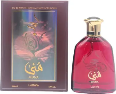 A perfume box and bottle are displayed side-by-side against a white background.