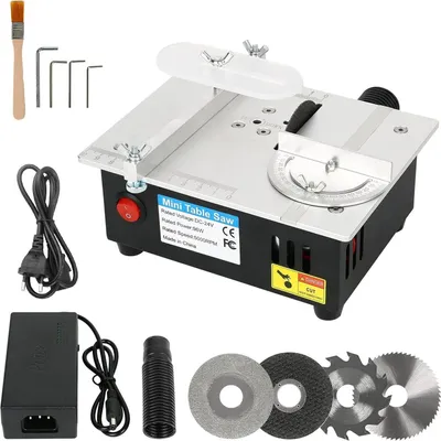 A mini table saw and its accessories are displayed on a white background.
