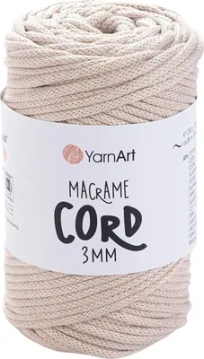A roll of macrame cord on a white background.