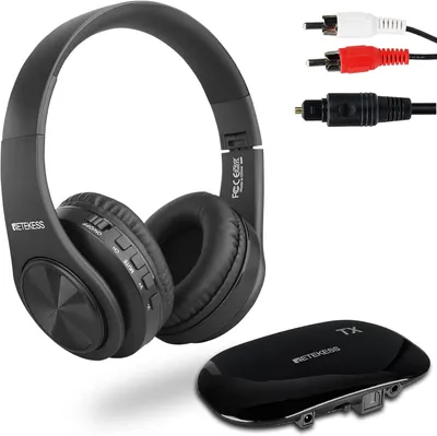 A black wireless headphone set with its transmitter and various cables, presented on a white background.