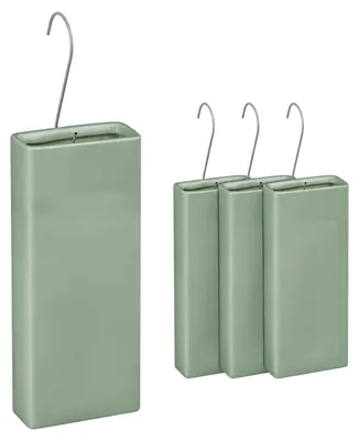 Immagine prodotto di Umidificatore per termosifoni, set da 4, evaporatore per radiatori, completo di ganci per il fissaggio, in Vetroceramica, profumato alla salvia, Immagine generata dall'IA