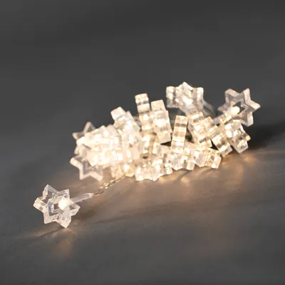 Obrázek produktu pro Konstsmide – LED dekorativní světelný řetěz, čiré hvězdy, 24 diod v teplé bílé barvě, 24V vnitřní transformátor, průhledný kabel; 4090-103