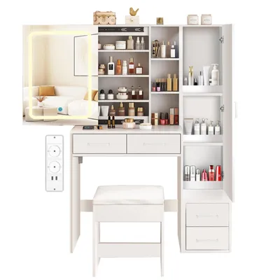 A white vanity table with a mirror and storage, along with a stool.