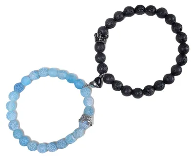 Produktbild von Set aus 2 Armbändern mit Perlen, verziert mit Chakra- und Herzanhängern